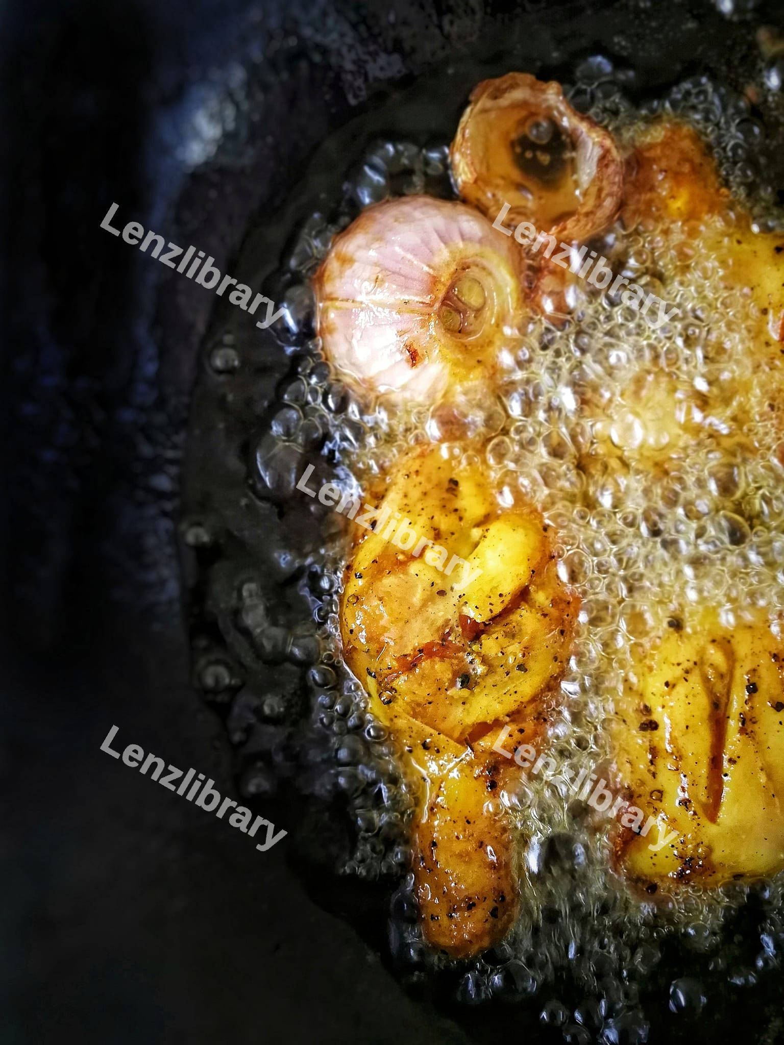 Chicken legs in the boiling oil